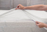 hand stretching mattress protector